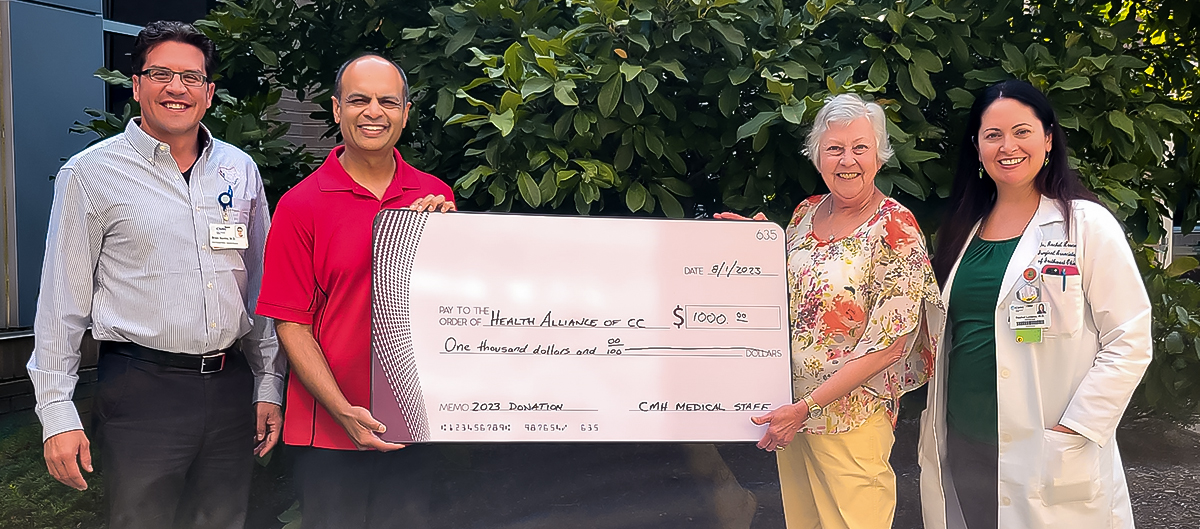 The Clinton Memorial Hospital Medical Staff presents check to the Health Alliance of Clinton County.  Pictured L - R: Drs. Santin and Patel; Kay Fisher, President of HACC; and Dr. Lovano.